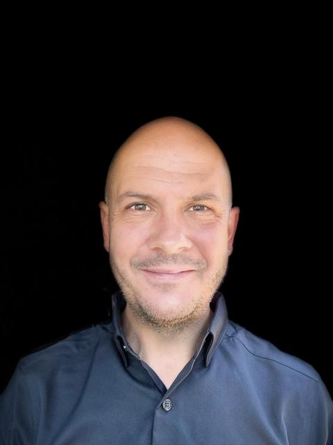 Headshot of Travis Britton